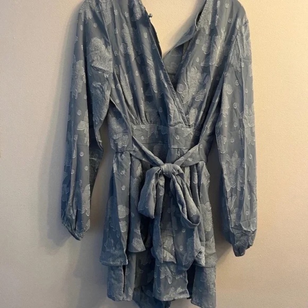 Light blue floral romper with tie at waist